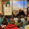 cPort President and CEO reads to students at Riverton Elementary School.