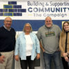 photo of 4 cPort and ECC employees after our local Credit Union Donated to the Equality Community Center Capital Campaign