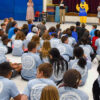 Auditorium of students assembled to receive career aspiration scholarship awards