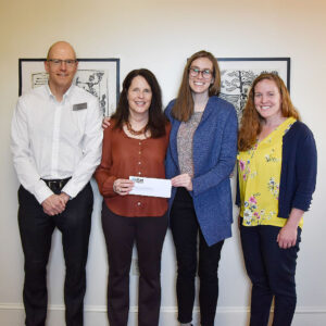 cPort Credit Union SVP and General Counsel Chris Van Dyck; Immigrant Legal Advocacy Project Executive Director Sue Roche; Immigrant Legal Advocacy Project Development Director Laura Simocko; and cPort Credit Union EVP and CFO Kelsey Marquis