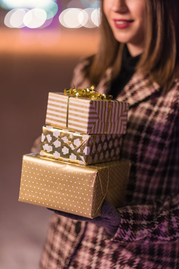 Woman Holding Gifts