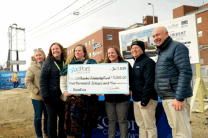 Lewiston cport presents check to Lewiston Auburn Metropolitan Chamber Foundation’s Scholarship Fund 