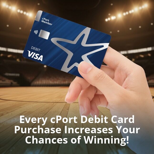 Hand holding a cPort Debit Card with basketball Court in the background