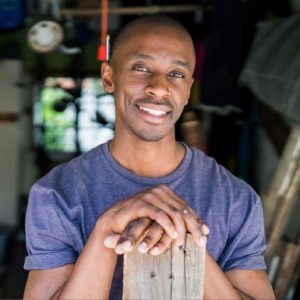 Carpenter small business owner with woodworking and contracting supplies