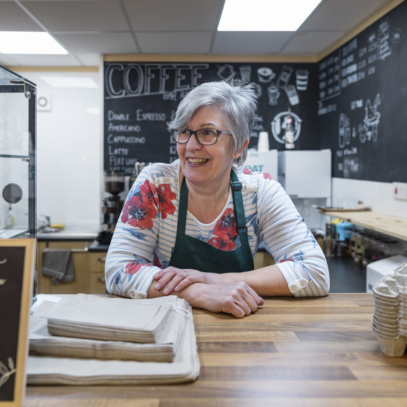 Woman working in a cafe/store