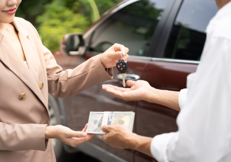 lease, rental car, sell, buy. Dealership manager send car keys to the new owner.  Sales, loan credit financial, rent vehicle, insurance,  renting, Seller, dealer, installment, car care business